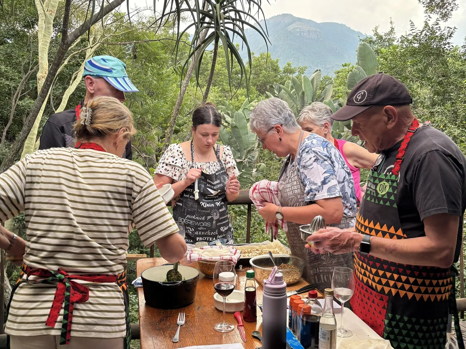 Outdoor cooking workshop with mountain views at Old Joe's Kaia